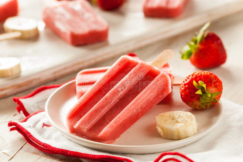 Homemade Strawberry and Banana Popsicles stock photos Homemade Strawberry and Banana Popsicles stock photos