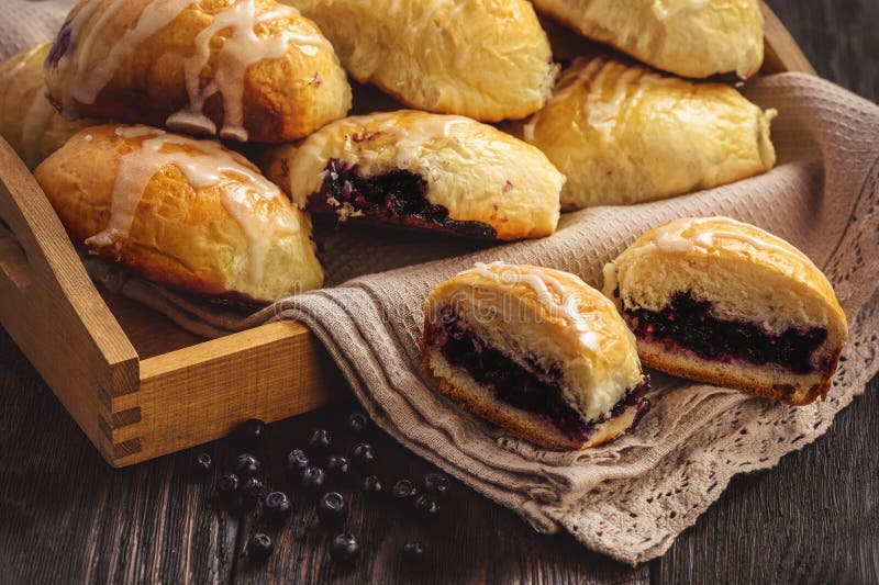 Homemade sweet buns with wild blueberry filling.