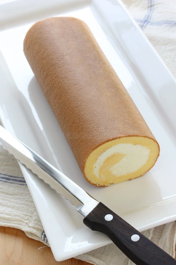Homemade swiss roll with whipped cream royalty free stock photos