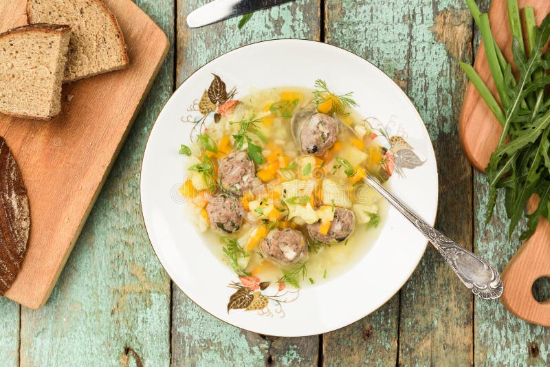 Homemade Vegetable Soup with Meatballs Served with Rye Bread and Stock ...