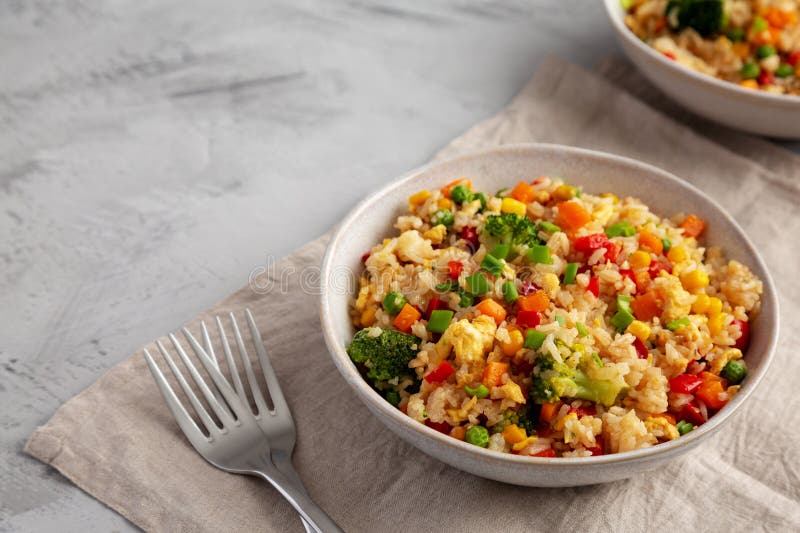 Homemade Veggie Fried Rice in Bowls, Side View. Copy Space Stock Image