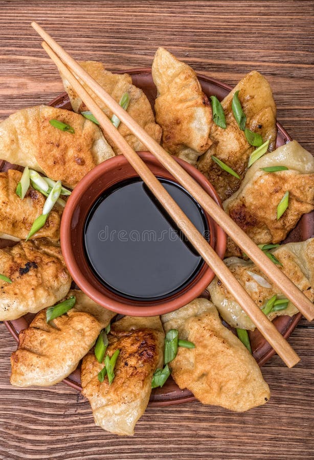 Homemade Ñhicken potstickers with soy sauce. royalty free stock photo Homemade Ñhicken potstickers with soy sauce. royalty free stock photo