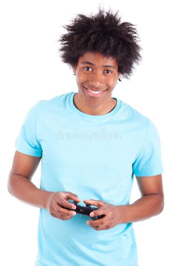 Homens adolescentes pretos novos que jogam jogos de vídeo - povos africanos fotografia de stock Homens adolescentes pretos novos que jogam jogos de vídeo - povos africanos fotografia de stock