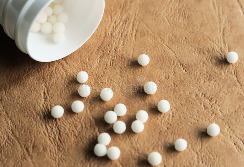 Container With Homeopathic Balls. Stock Photo Image of kits, wallet