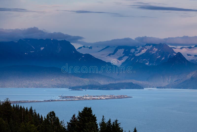 Glorious landscape of the Homer Spit in Kachemak Bay with glacier filled mountains in background. Glorious landscape of the Homer Spit in Kachemak Bay with glacier filled mountains in background