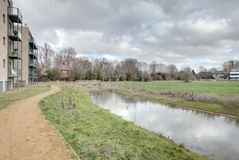 Homes built on flood plain stock photo. Image of brook 12988686
