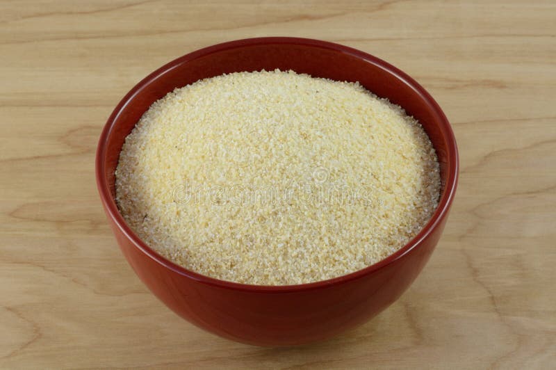 Hominy grits in bowl stock photo. Image of natural, healthy 87251046