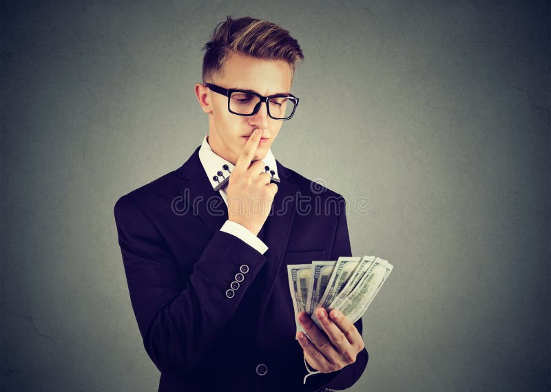 Homme ambitieux d'affaires avec l'argent photos libres de droits Homme ambitieux d'affaires avec l'argent photos libres de droits