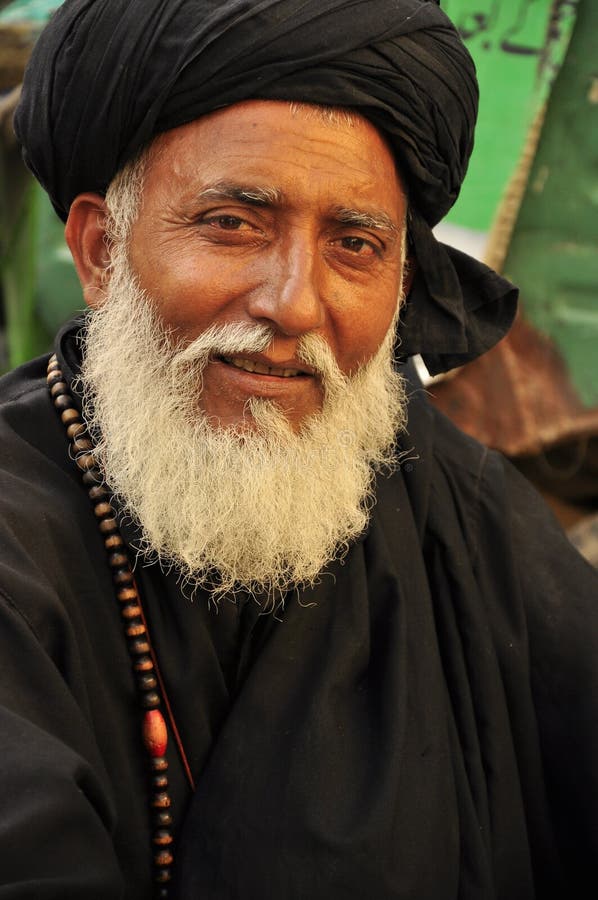 Homme arabe avec le turban noir images libres de droits Homme arabe avec le turban noir images libres de droits