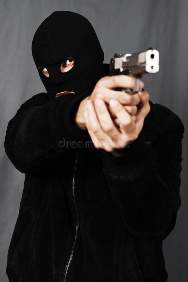 Homme armé images stock