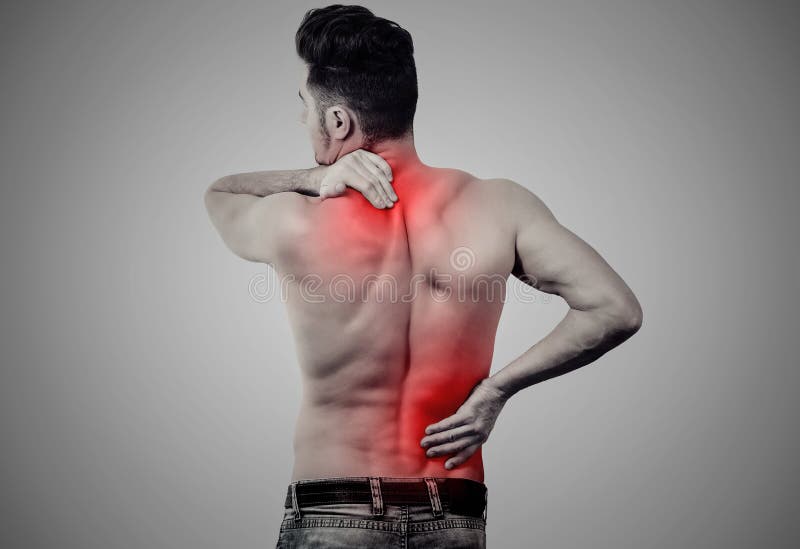 Homme avec douleurs de dos inférieures et supérieures image stock Homme avec douleurs de dos inférieures et supérieures image stock