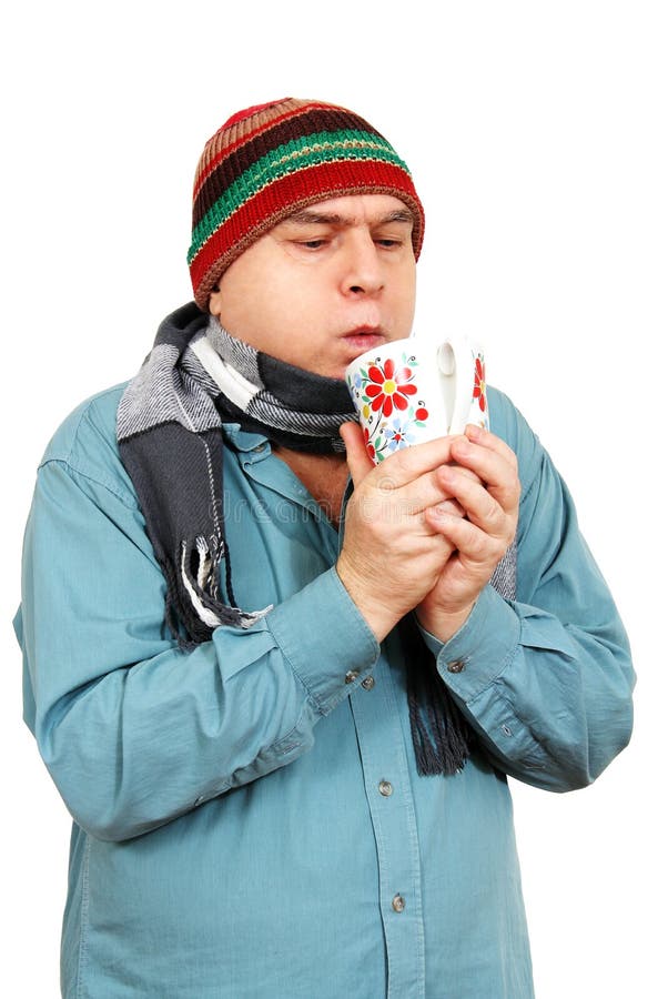 Homme avec une tasse de thé. image libre de droits Homme avec une tasse de thé. image libre de droits