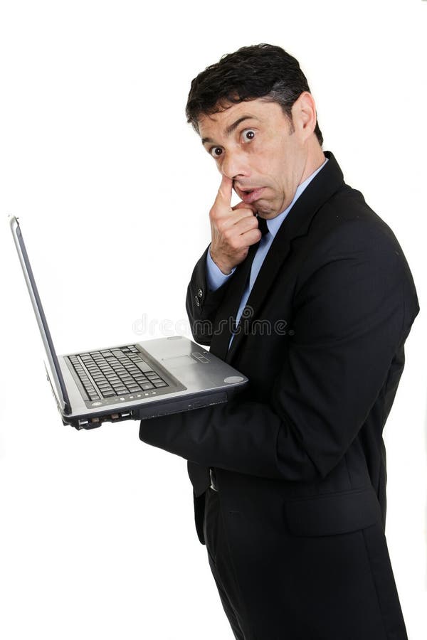 Homme d'affaires avec son doigt au sien photographie stock Homme d'affaires avec son doigt au sien photographie stock
