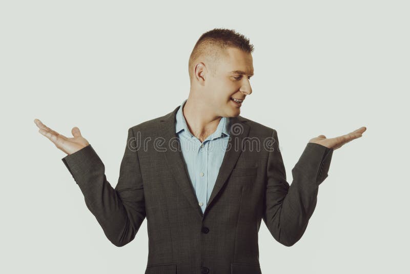 Homme d'affaires avec vide les deux mains photographie stock Homme d'affaires avec vide les deux mains photographie stock