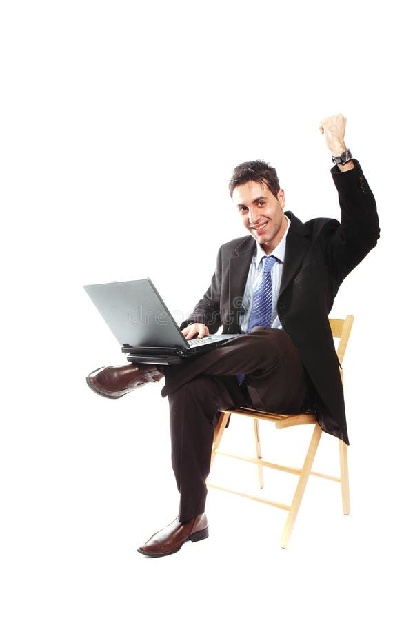 Homme d'affaires et son ordinateur portatif photographie stock libre de droits Homme d'affaires et son ordinateur portatif photographie stock libre de droits
