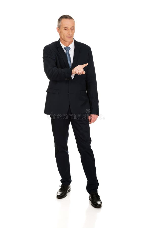 Homme d'affaires intégral appuyant sur le bouton abstrait image stock Homme d'affaires intégral appuyant sur le bouton abstrait image stock