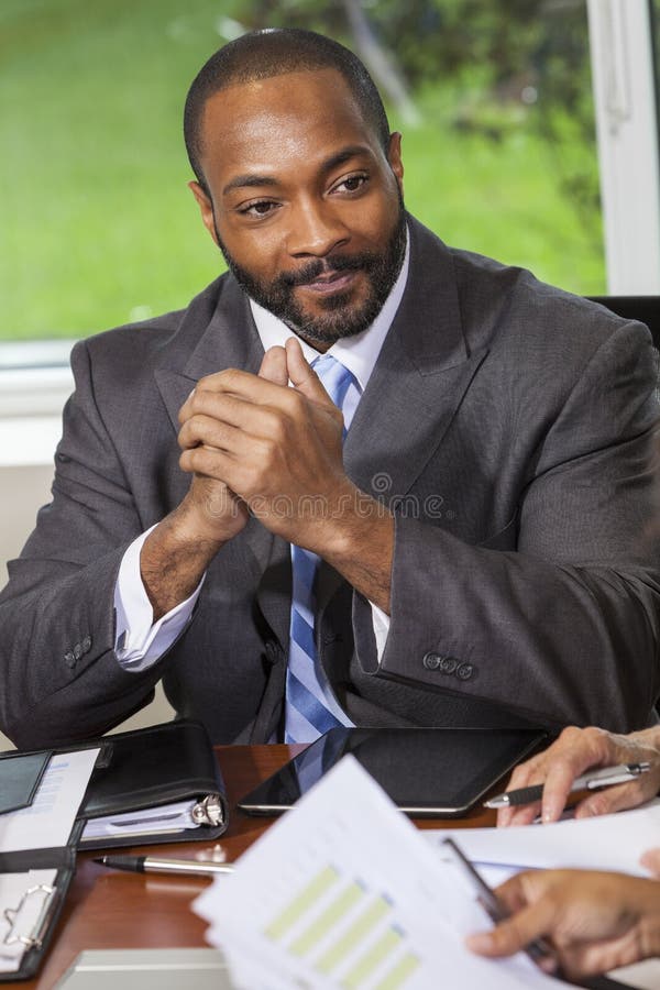 Homme d'affaires Man d'Afro-américain lors de la réunion images libres de droits Homme d'affaires Man d'Afro-américain lors de la réunion images libres de droits