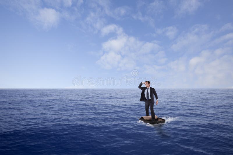 Homme d'affaires perdu en mer images stock Homme d'affaires perdu en mer images stock
