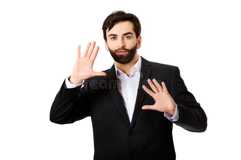 Homme d'affaires pressant l'écran abstrait image stock Homme d'affaires pressant l'écran abstrait image stock