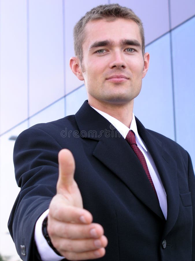 Homme d'affaires prêt à se serrer la main image stock Homme d'affaires prêt à se serrer la main image stock