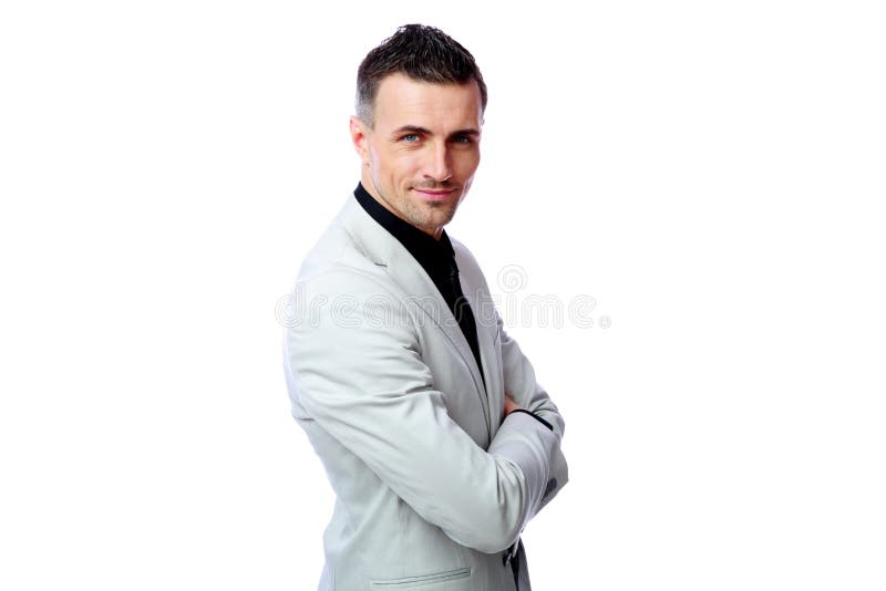 Homme d'affaires se tenant avec des bras pliés photos stock Homme d'affaires se tenant avec des bras pliés photos stock