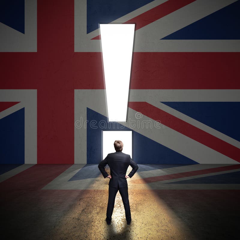 Businessman standing in front of a wall with the union jack and a portal. Businessman standing in front of a wall with the union jack and a portal