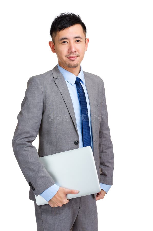 Homme d'affaires tenant l'ordinateur portable photos libres de droits Homme d'affaires tenant l'ordinateur portable photos libres de droits