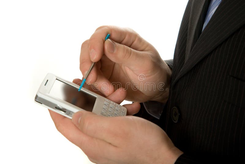 Homme d'affaires travaillant à un organisateur de pda images stock Homme d'affaires travaillant à un organisateur de pda images stock