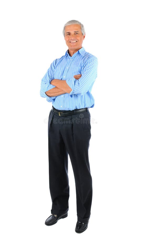 Smiling middle aged businessman standing with his arms folded. Full length over a white background. Smiling middle aged businessman standing with his arms folded. Full length over a white background.