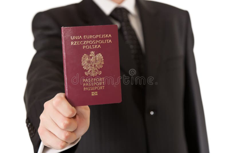 Man in suit holding passport on white isolated background. Man in suit holding passport on white isolated background