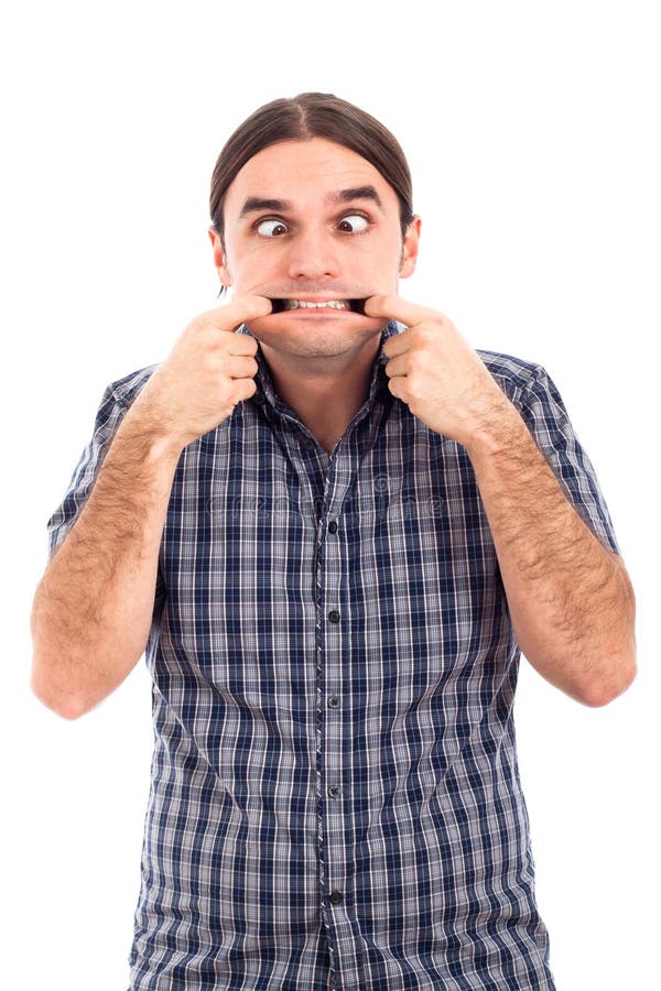 Homme effectuant les visages drôles photo libre de droits