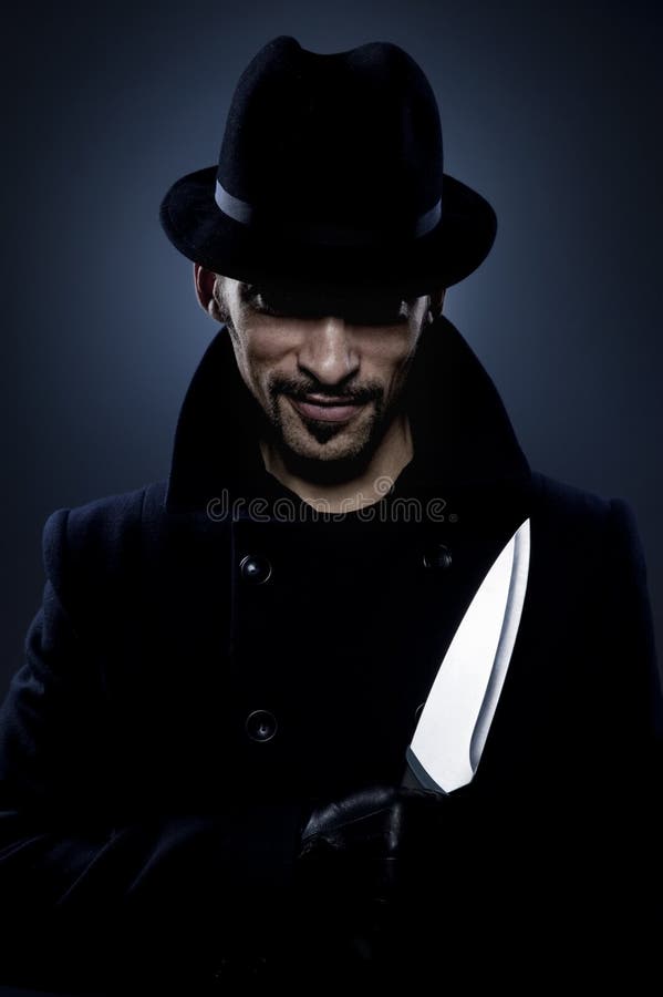 Homme effrayant avec un couteau image libre de droits Homme effrayant avec un couteau image libre de droits