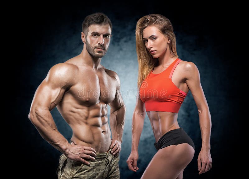 Homme et femme sportifs Couples de forme physique image libre de droits Homme et femme sportifs Couples de forme physique image libre de droits