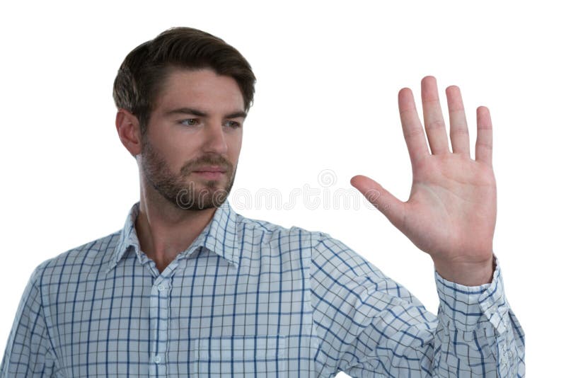 Homme faisant des gestes le signe d'arrêt sur le fond blanc image stock Homme faisant des gestes le signe d'arrêt sur le fond blanc image stock