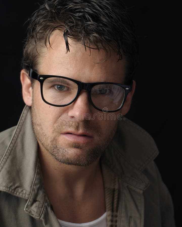 Headshot of crazy caucasian man with glasses. Headshot of crazy caucasian man with glasses