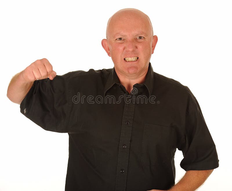 Homme fâché avec le poing augmenté images libres de droits Homme fâché avec le poing augmenté images libres de droits
