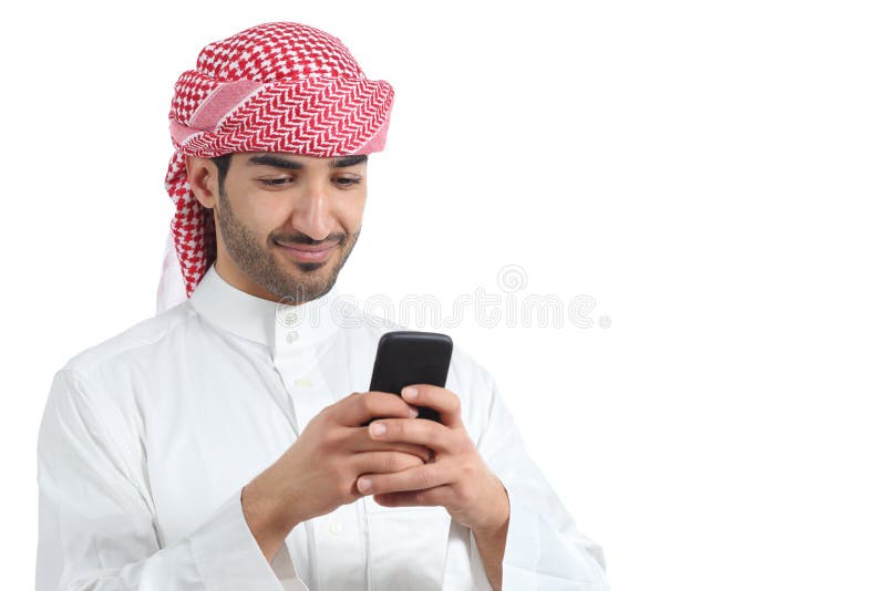 Arab saudi man watching social media in the smart phone isolated on a white background. Arab saudi man watching social media in the smart phone isolated on a white background
