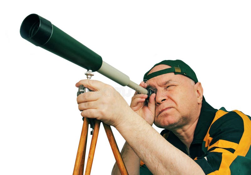 Homme, un astronome regardant par un télescope. photographie stock Homme, un astronome regardant par un télescope. photographie stock