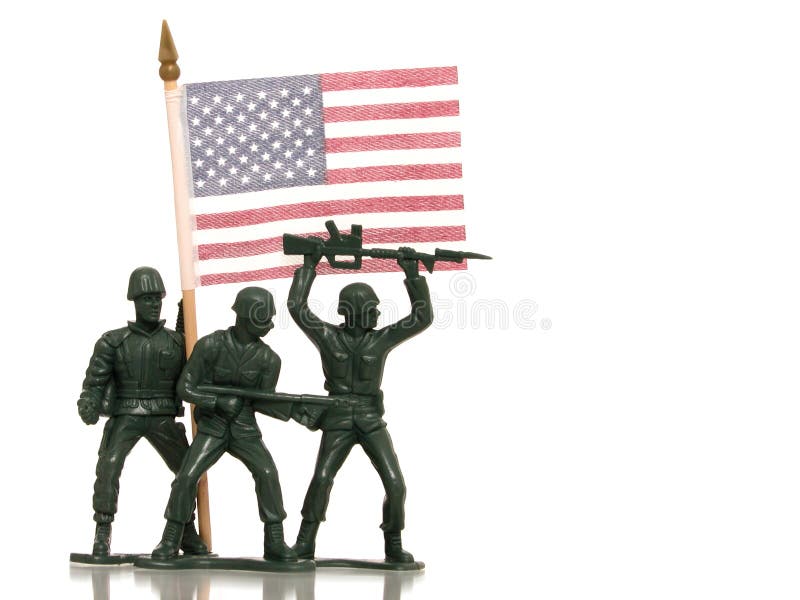Hommes verts d'armée de jouet avec l'indicateur des USA sur le blanc photos libres de droits Hommes verts d'armée de jouet avec l'indicateur des USA sur le blanc photos libres de droits