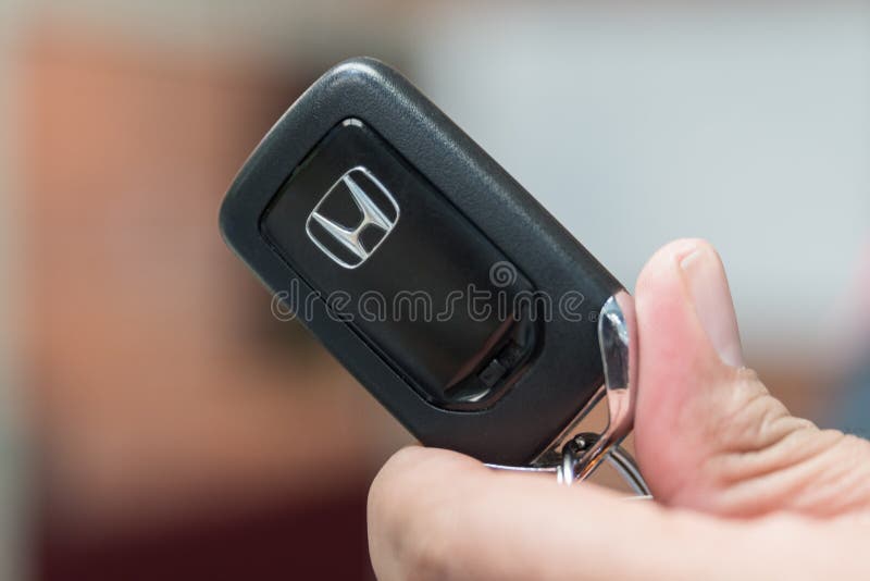 Remote Key FOB for modern car in hand