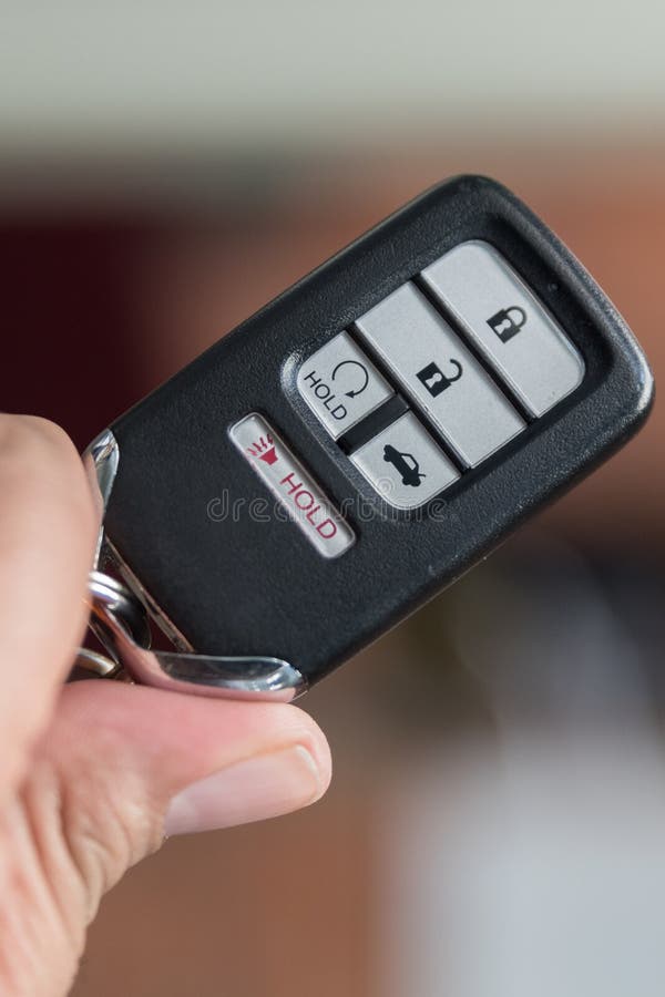 Remote Key FOB for modern car in hand