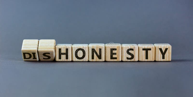 Honesty or dishonesty symbol. Turned cube and changed the word `dishonesty` to `honesty`. Beautiful grey background. Business royalty free stock photos