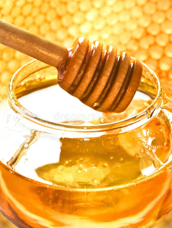 Honey and bee honeycomb stock photo Honey and bee honeycomb stock photo