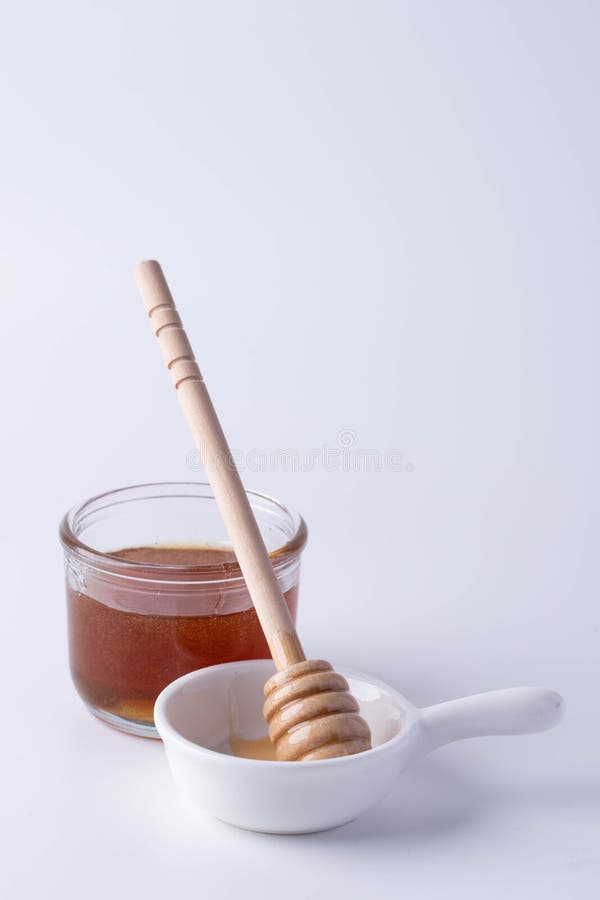 Honey in a Clear Glass and Honey Dipper Stock Image Image of gold