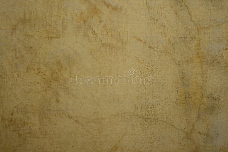 Honey colored cracked plaster wall