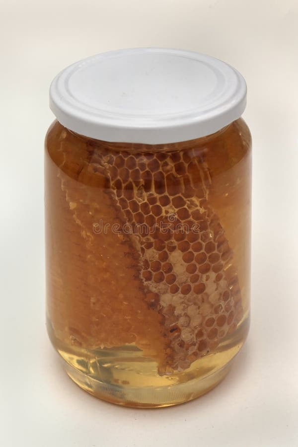 Honey comb jar stock image. Image of organic, container 67091073