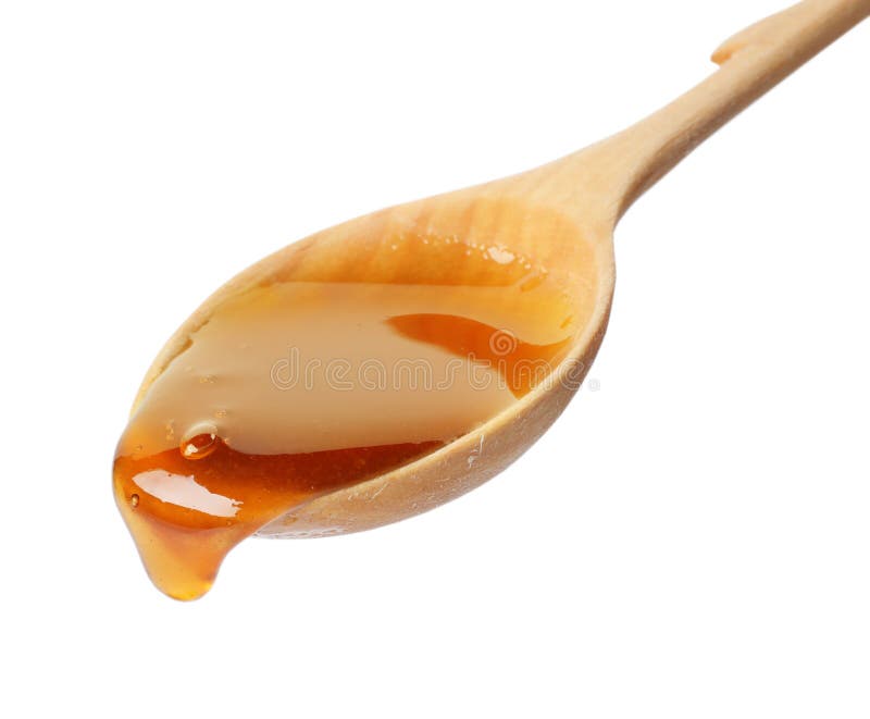 Honey dripping from spoon royalty free stock photo Honey dripping from spoon royalty free stock photo