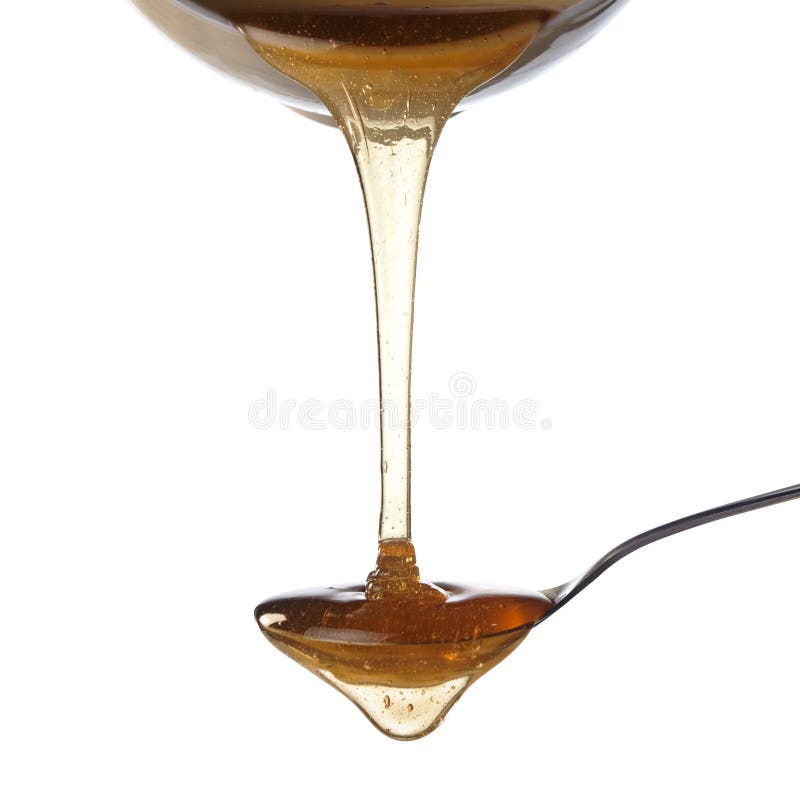 Honey and spoon stock photos Honey and spoon stock photos