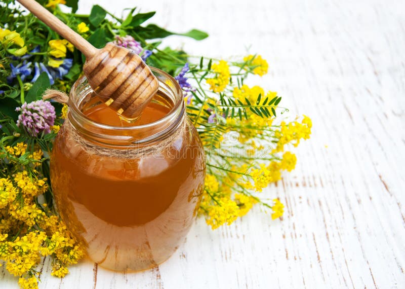 Honey and wild flowers stock photo. Image of glass, aroma 57826476