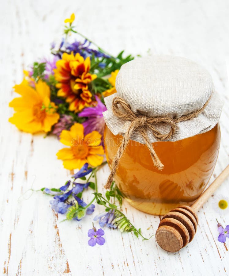 Honey and wild flowers stock image. Image of freshness 58130689